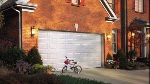 clopay value plus series heavy duty garage door on brick house