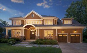 clopay canyon ridge limited edition garage doors on house at evening
